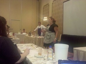 Gina pontificates while Peter models